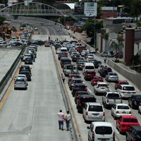 Abren tercer carril en el Paso Exprés de Cuernavaca; colonos hacen bloqueo