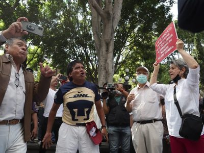 Altercado en Puebla entre marchistas y simpatizantes de AMLO (Video)