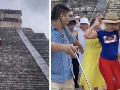 #LadyChichenItza: mujer sube a la pirámide, la abuchean y le avientan agua