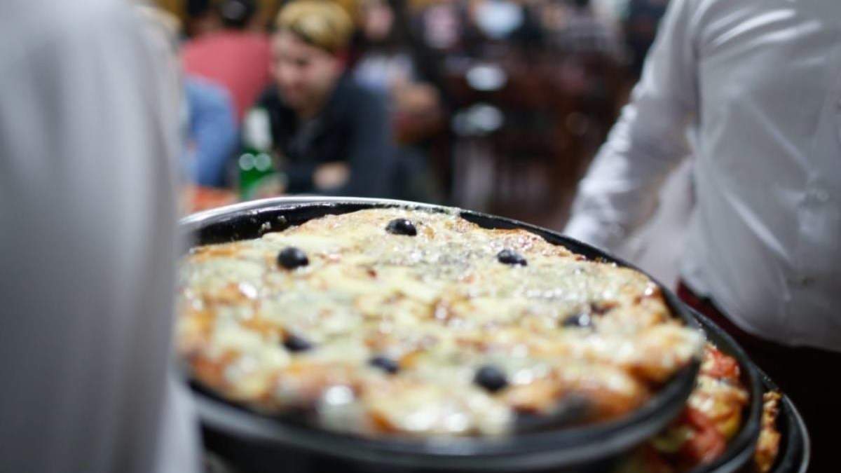 Noche de la pizza y las empanadas. Fuente: (Instagram)