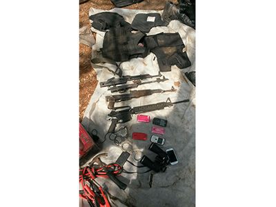 Fiscalía de Jalisco halla narcocampamento con restos humanos