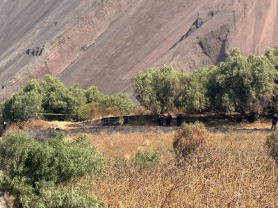 Hallan cuerpo sin vida de recién nacido dentro de una maleta en camino de terracería