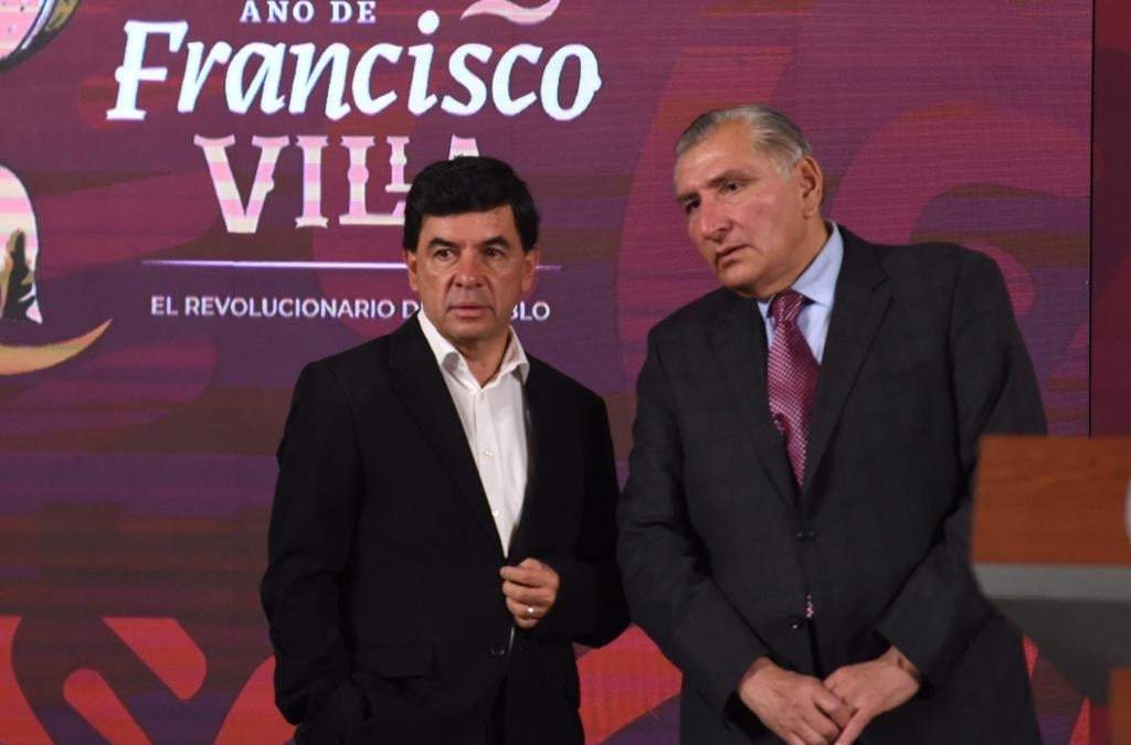 Los funcionarios durante la conferencia matutina