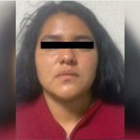 Detienen en Neza a mujer que arrastraba por la calle un costal con un cuerpo dentro