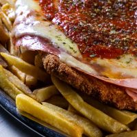 Milanesa napolitana: la receta simple y con pocos ingredientes para preparar este clásico argentino