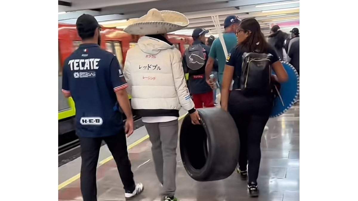 Aficionados a F1 cargan llanta