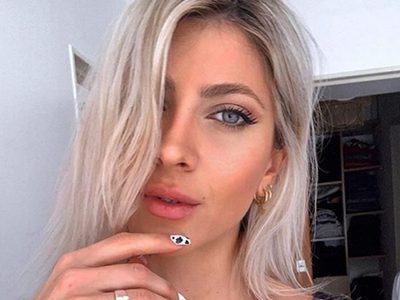 ¡Infinitas piernas! Cande Ruggeri no defraudó al lucir diminuto vestido blanco y quedó en evidencia