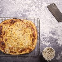 Tenés antojo de pizza, pero te aterran las calorías: mirá esta receta fit bien crocante con harina de almendras