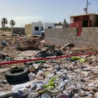 Hallan a mujer quemada y con tiro de gracia en Mexicali
