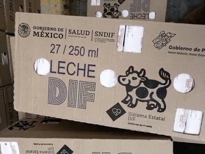 Denuncian reparto de leche con sellos del gobierno morenista... para favorecer a candidato de PAN