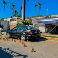 Emboscan a policías que salían del penal de Las Cruces, en Acapulco; dos murieron