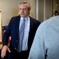 El Presidente se comprometió a reforzar la ayuda estatal en las villas