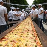 Conmemoran con festejos dos récords Guinness en empanadas y pizzas