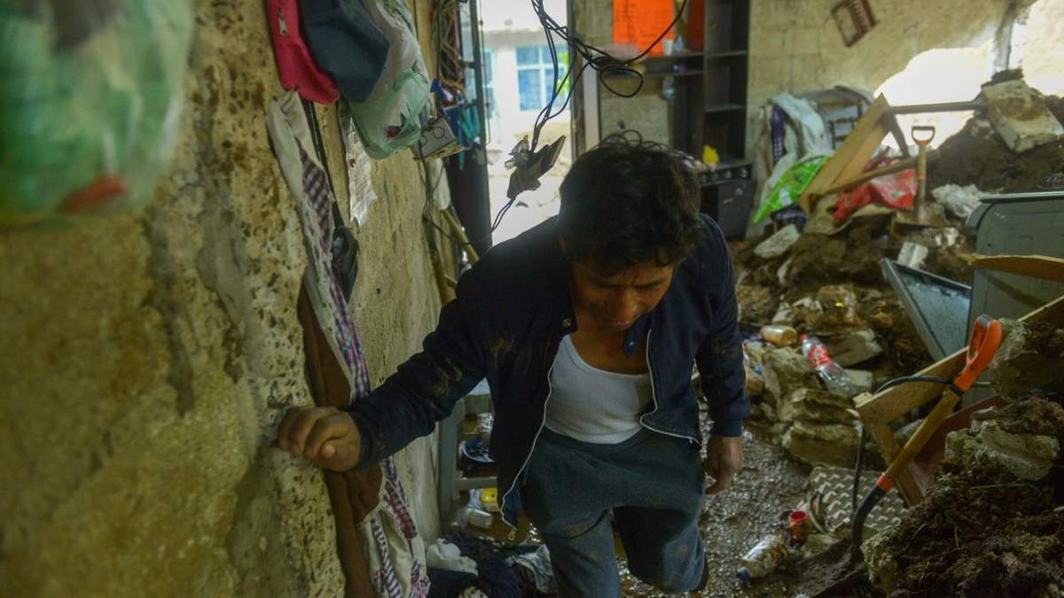 Vivienda dañada por la tormenta tropical Chris
