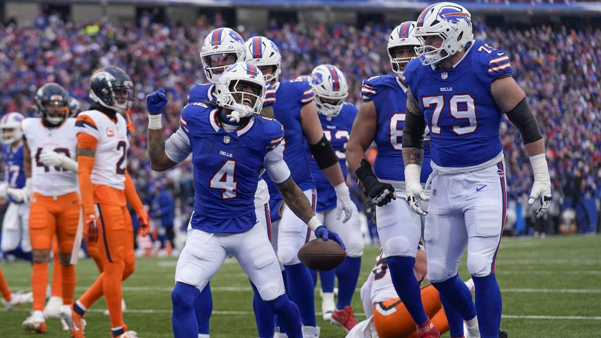 James Cook de los Bills de Buffalo celebra después de conseguir un touchdown en contra de los Broncos de Denver