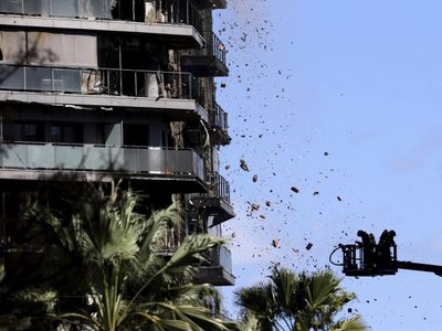 Buscan a 14 desaparecidos tras incendio que dejó cuatro muertos en España