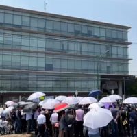 Reclamos de trabajadores e incertidumbre en el último día de existencia del INAI