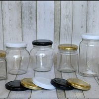 Decoración con frascos de vidrio: convertí los que tenías guardados en piezas originales con lana y pegamento