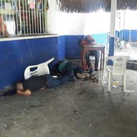 Comando ejecuta a tres en un autolavado en Oaxaca