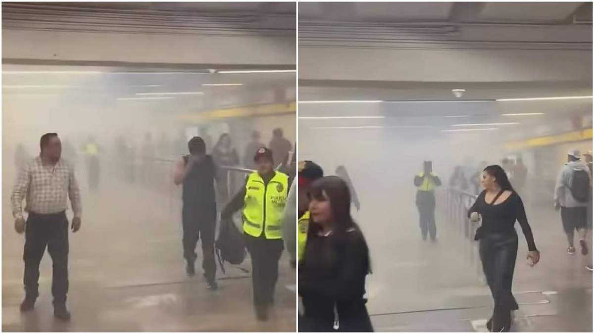 Usuarios del Metro caminan rodeados de humo tras el lanzamiento de petardos en la estación La Raza durante un enfrentamiento entre porros