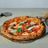 Pizza estilo napolitana: receta fácil y el secreto para que quede perfecta y mejor que la de las pizzerías