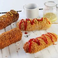 Receta de banderillas coreanas: el combo perfecto de salchicha, queso y papa que te hará agua la boca y brillar los ojos