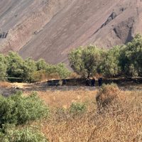 Hallan cuerpo sin vida de recién nacido dentro de una maleta en camino de terracería