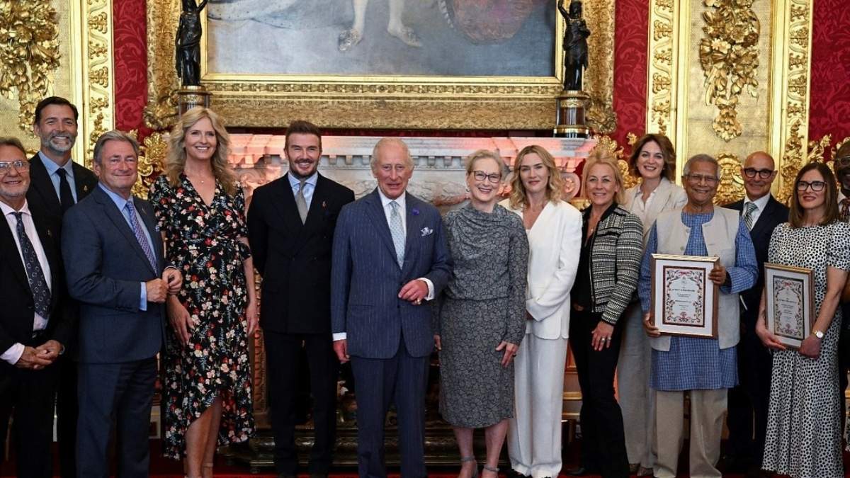 David Beckham con el rey Carlos III