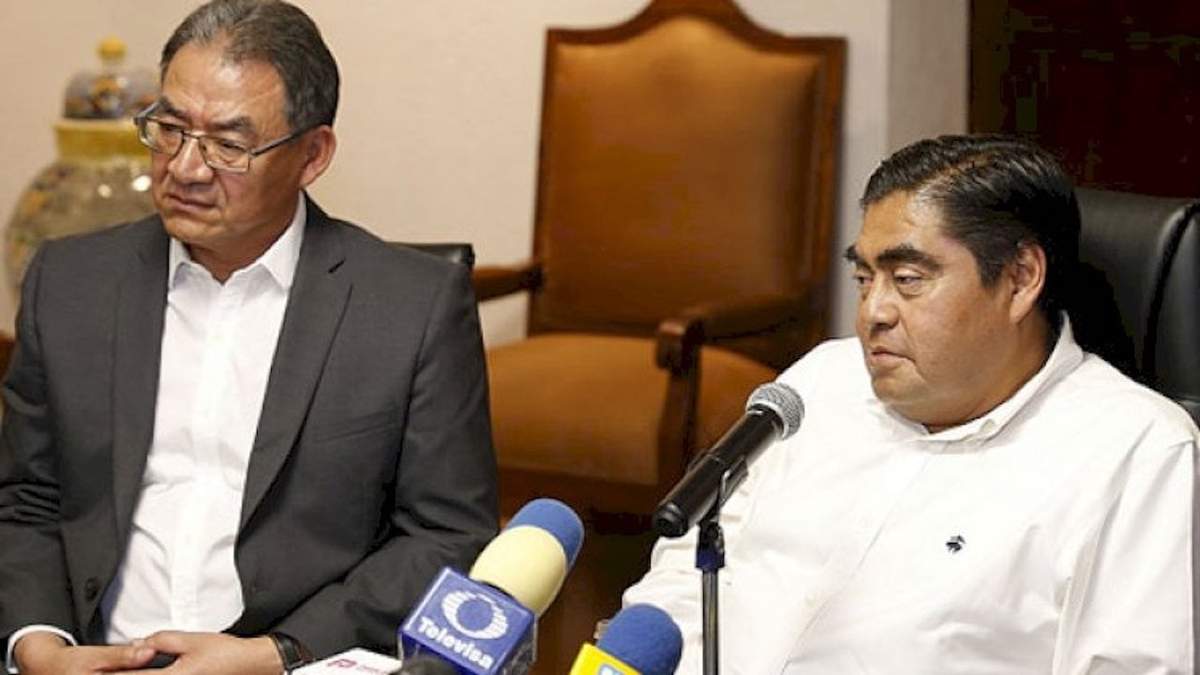 Melitón Lozano y Miguel Barbosa