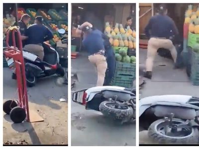 Motociclista da golpiza a policía porque lo infraccionó en mercado de Querétaro (Video)
