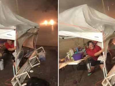 Se viraliza video de vendedora de elotes que se aferra a mantener su puesto en plena tormenta