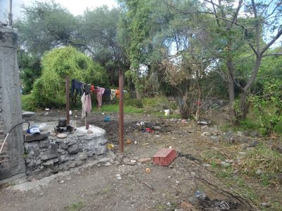 Niño violentado es enterrado en una maleta en el patio de su casa; detienen a su papá