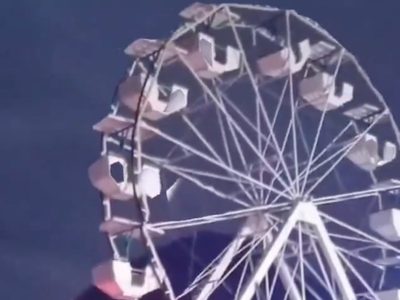 Padre e hija caen desde lo más alto de una rueda de la fortuna