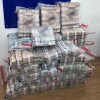 Detienen a dos hombres que portaban unos 90 mdp en bolsas de plástico en Tijuana