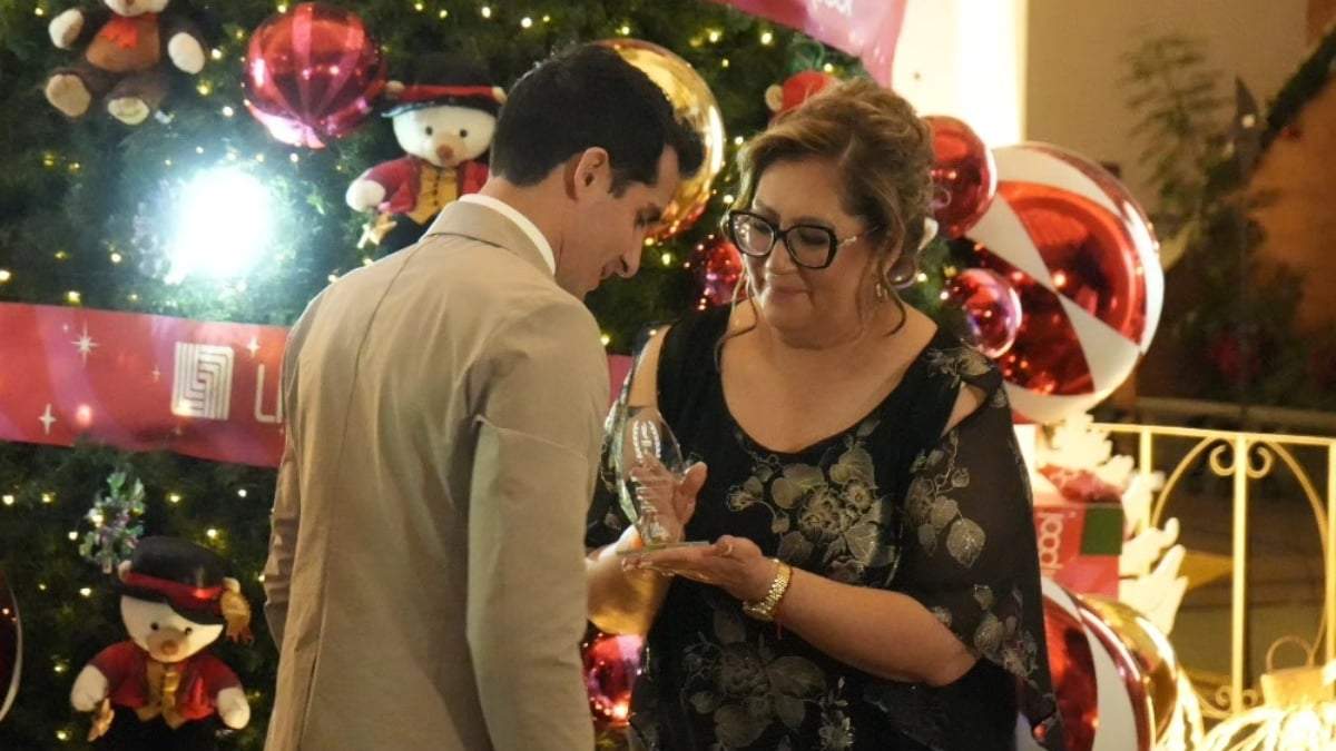 Liliana Suárez, exdirigente de Copame y quien asumió como secretaria general del organismo, con Rommel Pacheco, director de la Conde