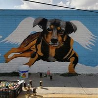 Inmortalizan en mural a “Scooby”, perro aventado a un cazo con aceite hirviendo