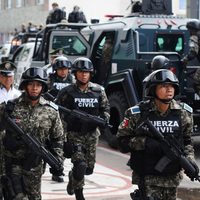 Policías en Veracruz abaten a 3 criminales que traían un cadáver en la cajuela