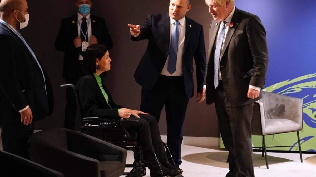 Karine Elharrar, Naftali Bennett y Boris Johnson