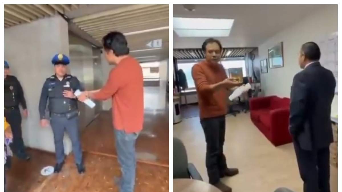 Marx Arriaga escoltado por policías en las instalaciones de la SEP