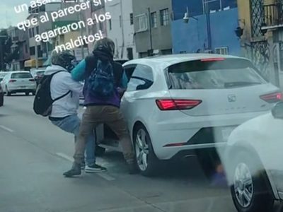 Automovilista forcejea con asaltantes en Circuito Interior; fueron detenidos (Videos)