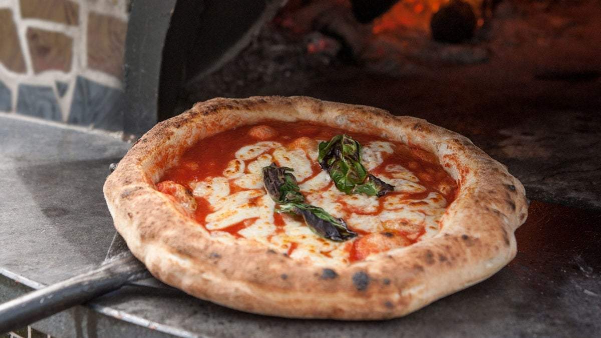 Pizza Margarita, de la mano de la nobleza. Fuente: (Instagram)