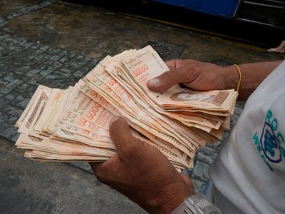 Venezuela quitará seis ceros a su moneda e introducirá una divisa digital