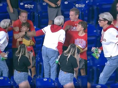 Exhiben a mujer que arrebata pelota de beisbol a niño durante juego de los Phillies vs. Marlins