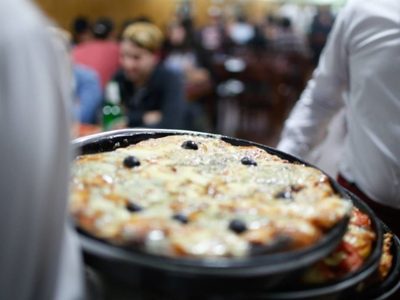Celebran el Día de la Pizza y las empanadas con interesantes promociones