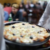 Celebran el Día de la Pizza y las empanadas con interesantes promociones