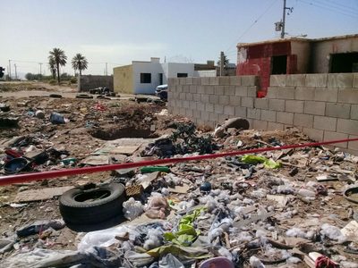 Hallan a mujer quemada y con tiro de gracia en Mexicali
