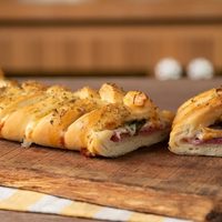Pizza trenzada: la receta que vas a querer hacer una vez por semana por lo simple y rica que es