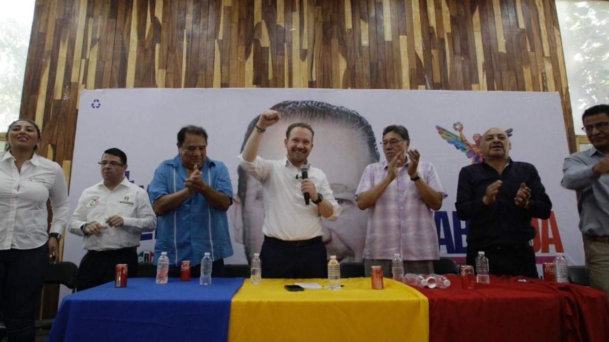 Santiago Taboada con Fernando Ruano, de camisa azul