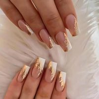 Nail Art: diseños en blanco y dorado para uñas largas y cortas para ir a trabajar con estilo