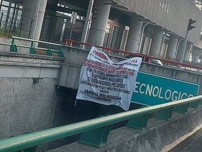 Con mantas, La Familia Michoacana amenaza con derramar sangre en Feria de Metepec